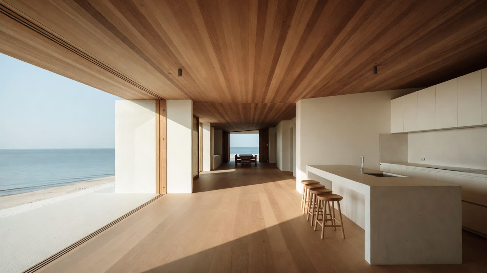 Kitchen with a stone island and ocean view